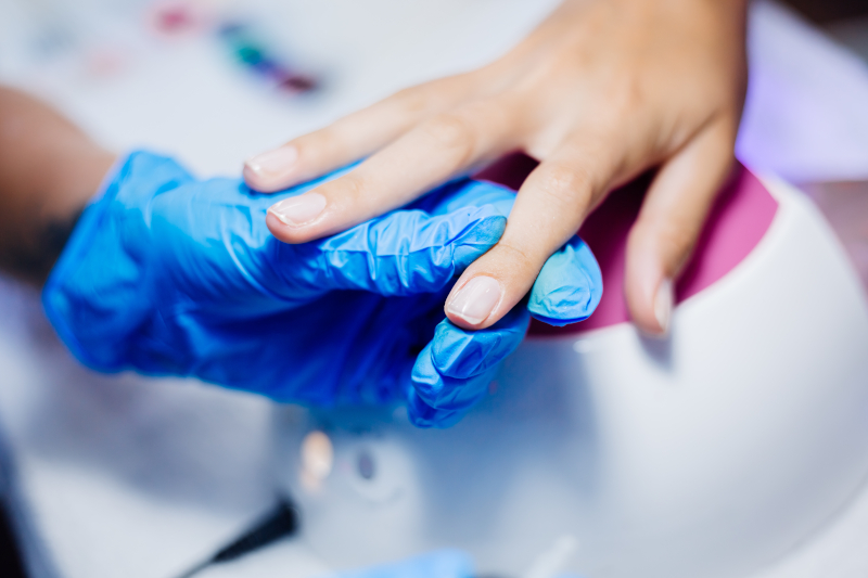 beautiful female hands finger nail treatment making process professional nail file drill action beauty hand care concept beautiful female hands finger nail treatment making process professional nail file drill action beauty hand care concept